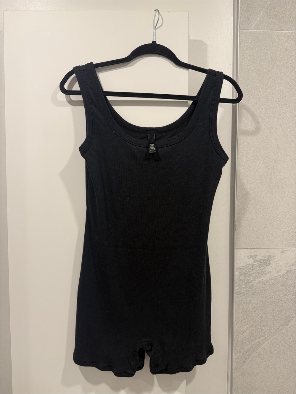 SKIMS Black Ribbed Scoop-Neck Tank Romper